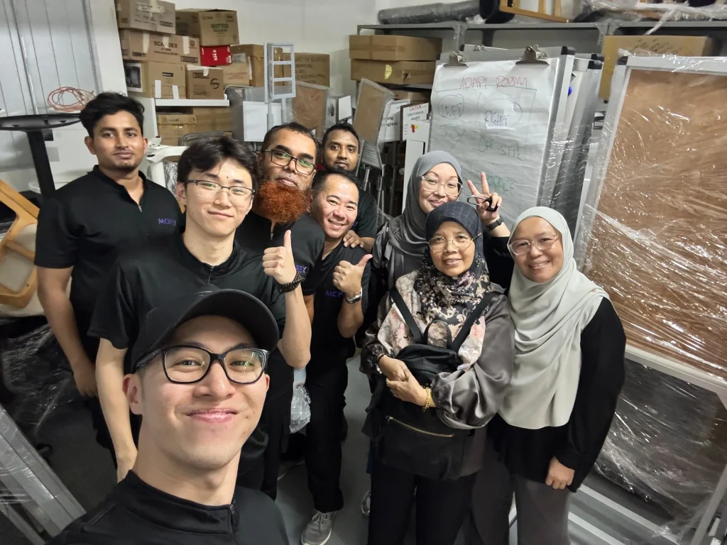 Mofex crew and client team together after a completed office move