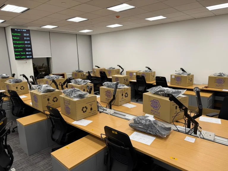 Office workstations with Mofex moving boxes ready for relocation