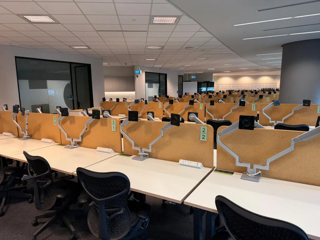 Rows of office workstations reinstalled after a Mofex commercial move